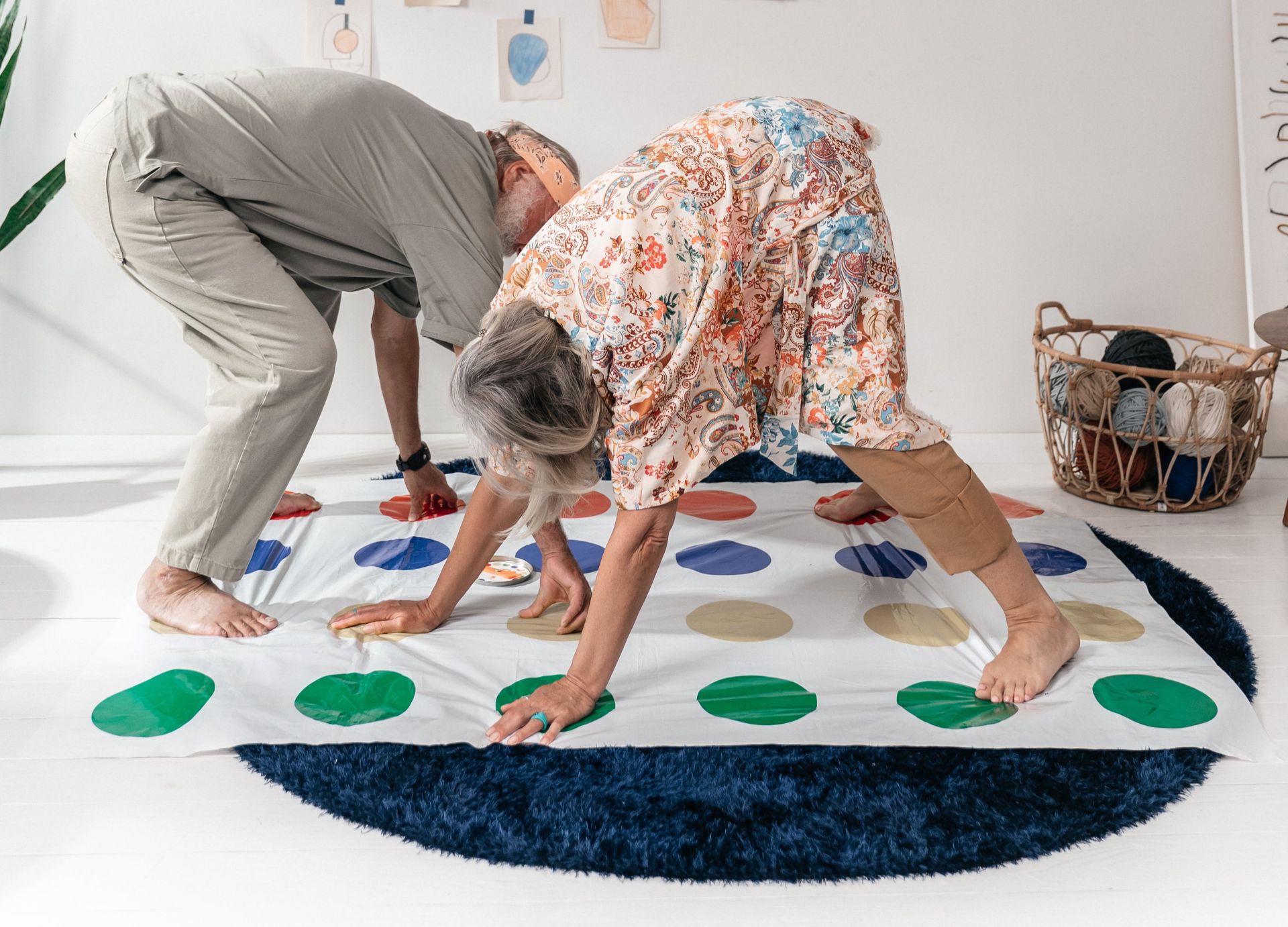 An Elderly Couple Playing with Gaming Floor Mat